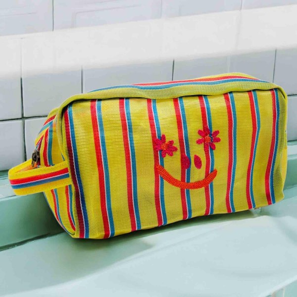 Kosmetiktäschchen woven plastic smile yellow