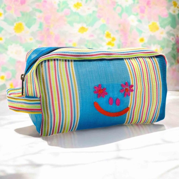 Kosmetiktäschchen woven plastic smile blue